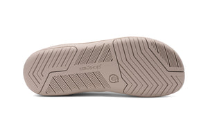 Undersidan av Xero Shoes Nexus Knit Silver Lining – stilren barfotasko i stickad beige mesh med bred tåbox, flexibel yttersula och noll drop för naturlig fotrörelse i vardagen